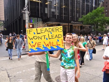 photos marchers signs people's climate march